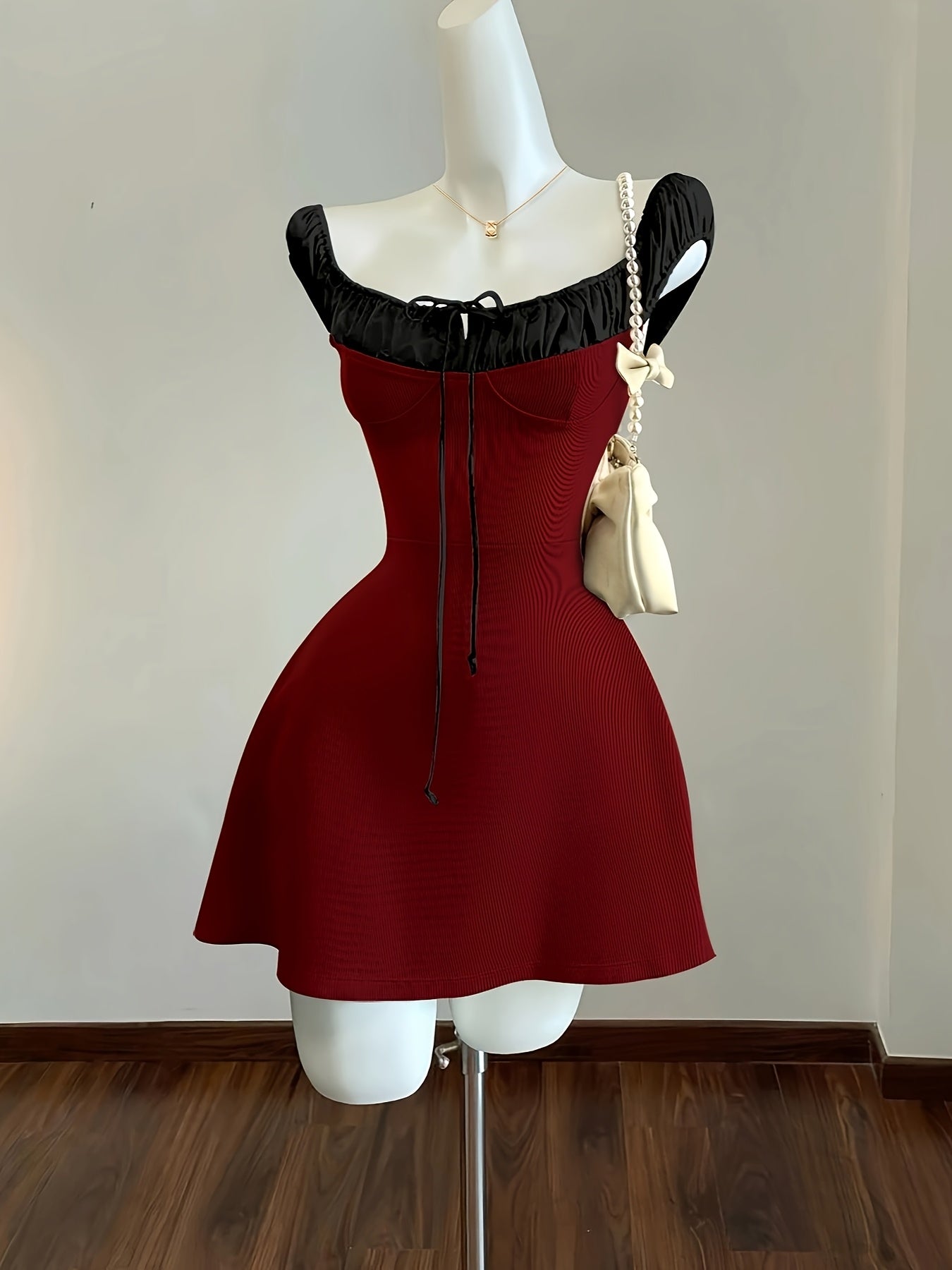 Elegant Off-Shoulder Red Mini Dress with Black Trim - Cinched Waist, Lace-Up Detail, Ruffled Hem, Perfect for Summer Vacation, Vacation Dress | Offshoulder Dress | Construction, Cute Dresses